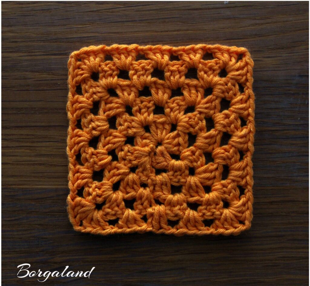 Einfarbiges klassisches Granny Square in warmem Orange