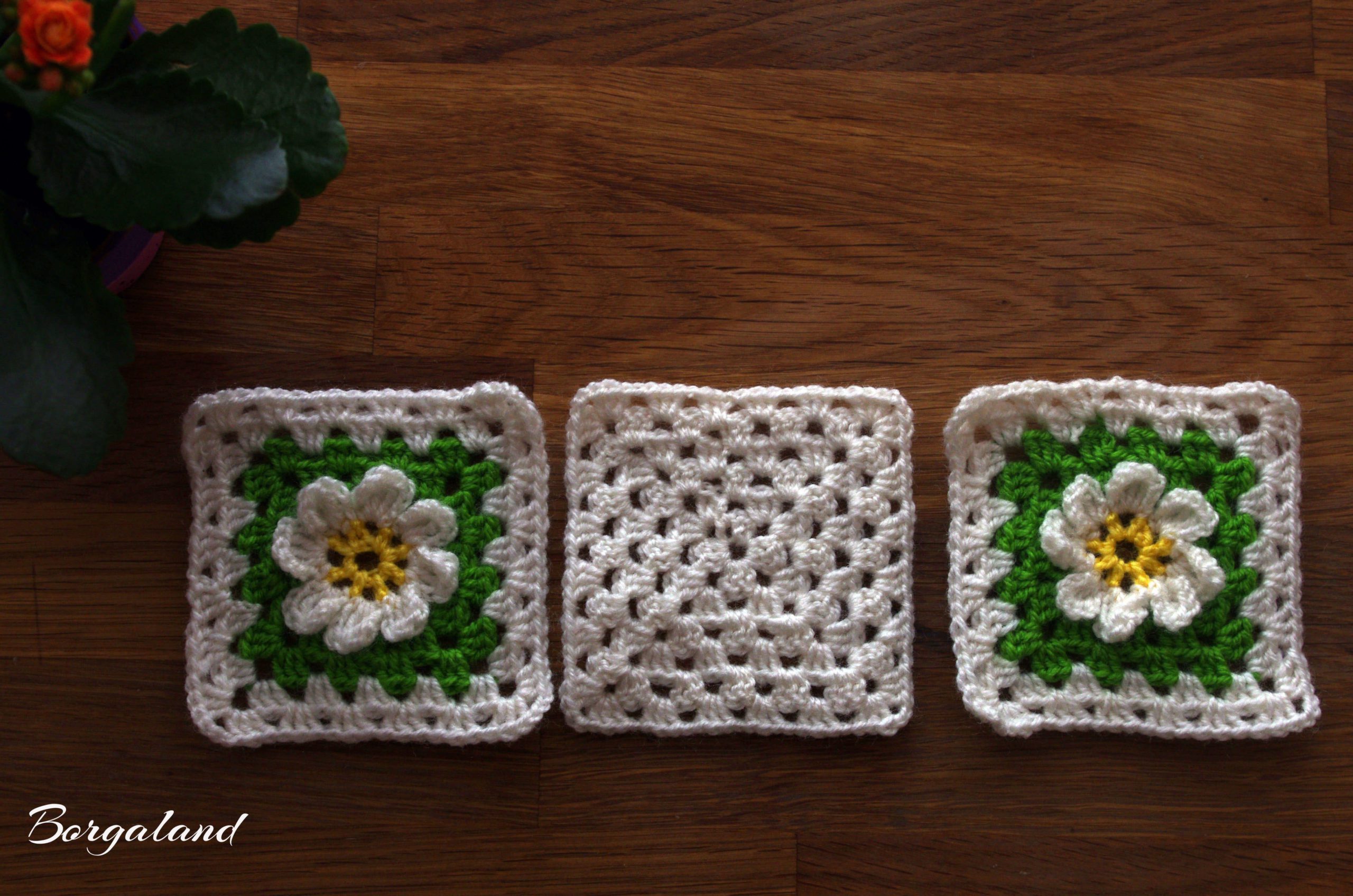 Drei gehäkelte Granny Squares: zwei mit Margaritenblume, eines klassisch einfarbig – ideal zum Kombinieren